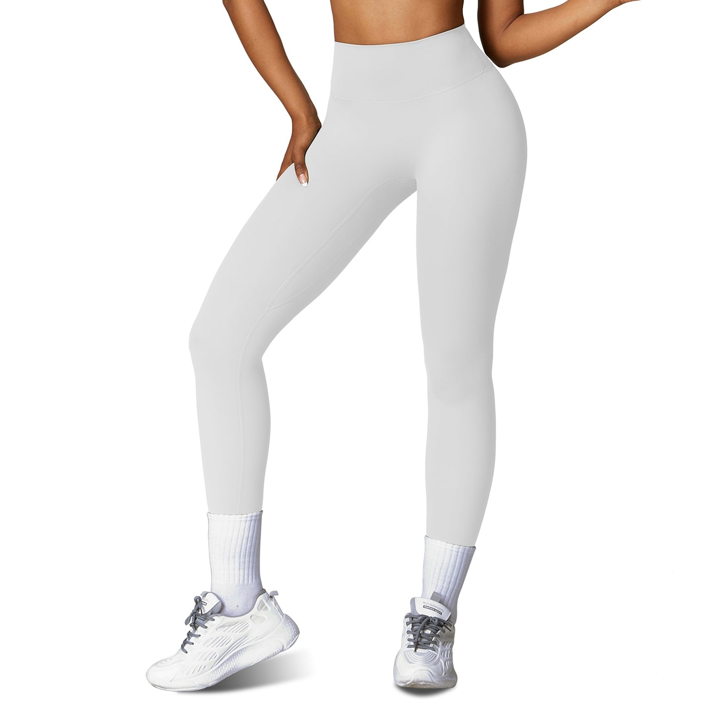 Women wearing high-waisted training leggings designed for workouts and active movement