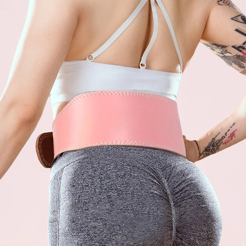 Woman wearing pink leather weightlifting belt during training