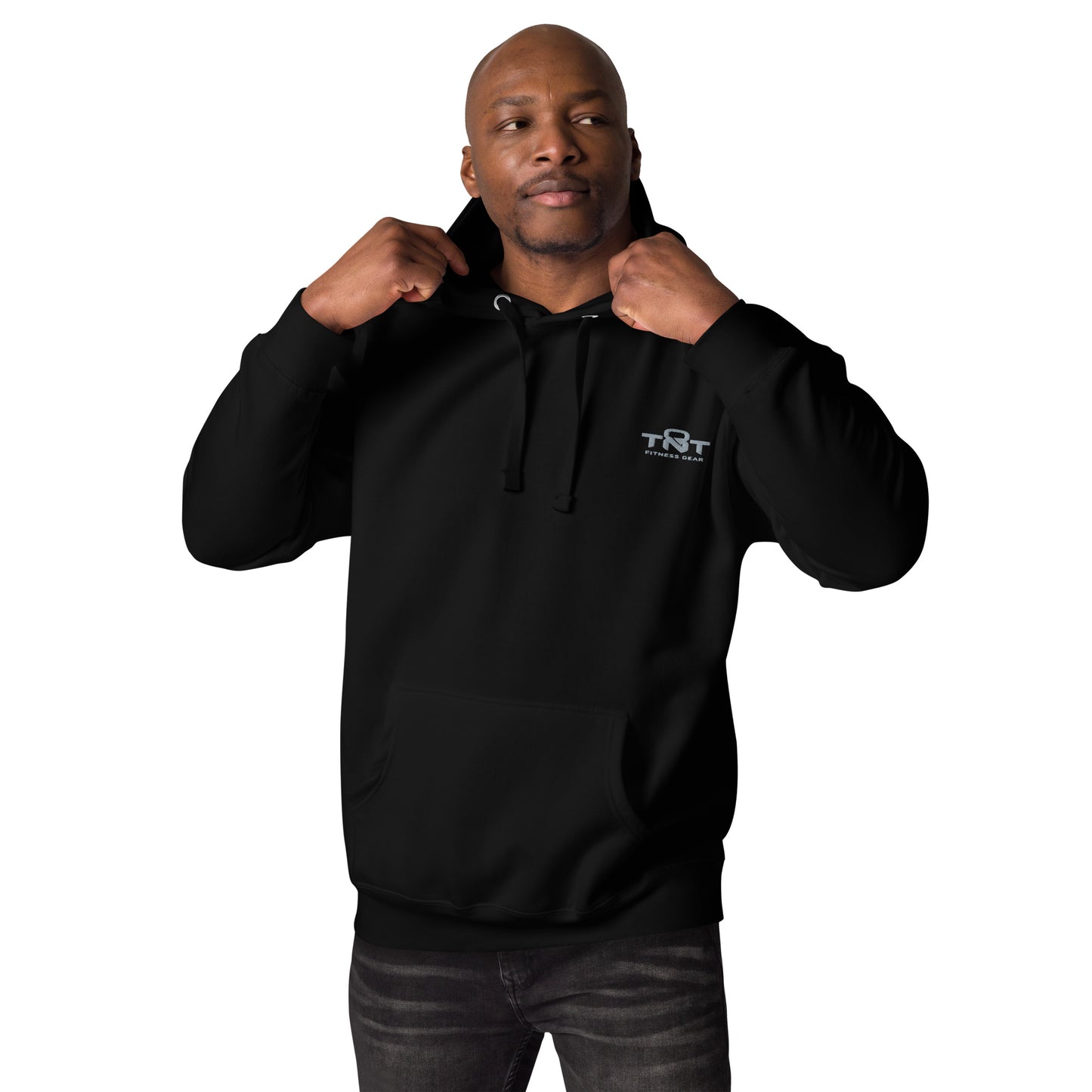 Black unisex TNT Fitness Gear hoodie with minimalist chest logo, front pouch pocket, and athletic fit for gym and lifestyle wear.