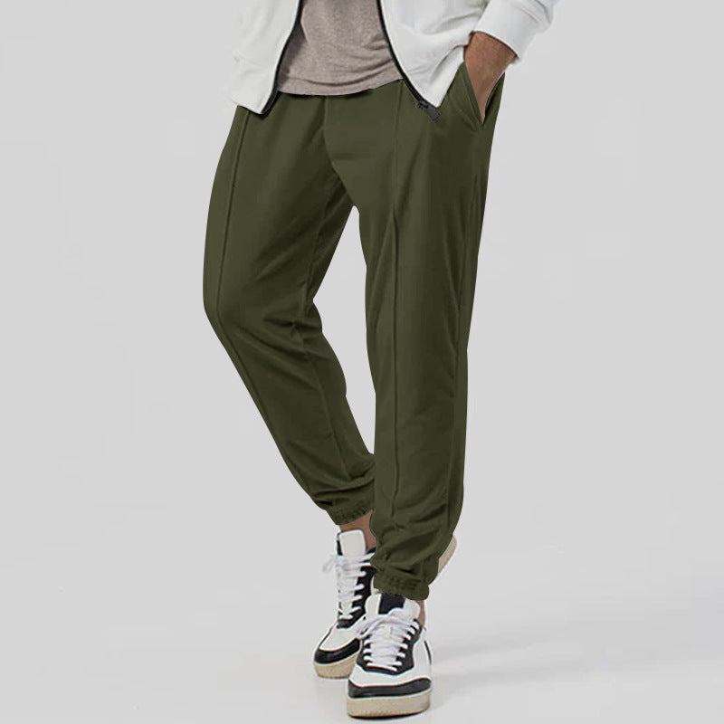Men’s tapered casual joggers in army green, front view