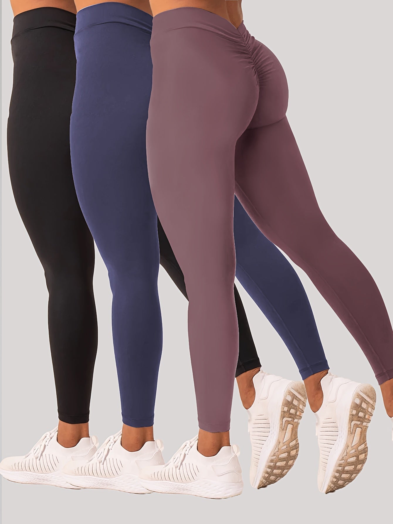 Women wearing high-waisted training leggings designed for workouts and active movement