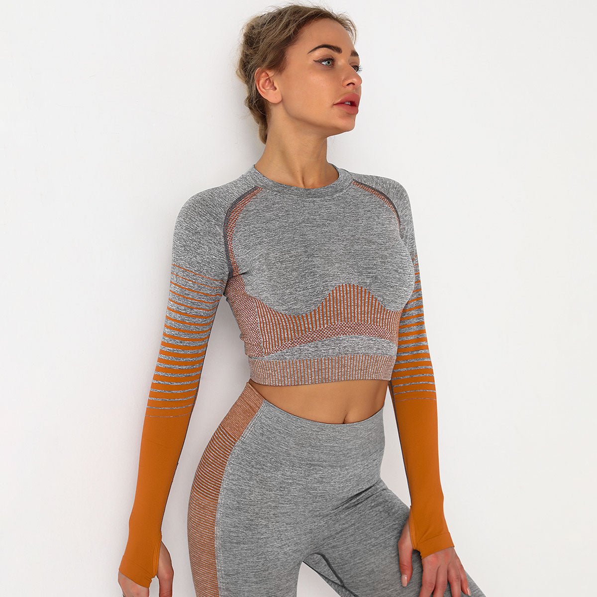 Women wearing a seamless long sleeve training set designed for workouts and active movement