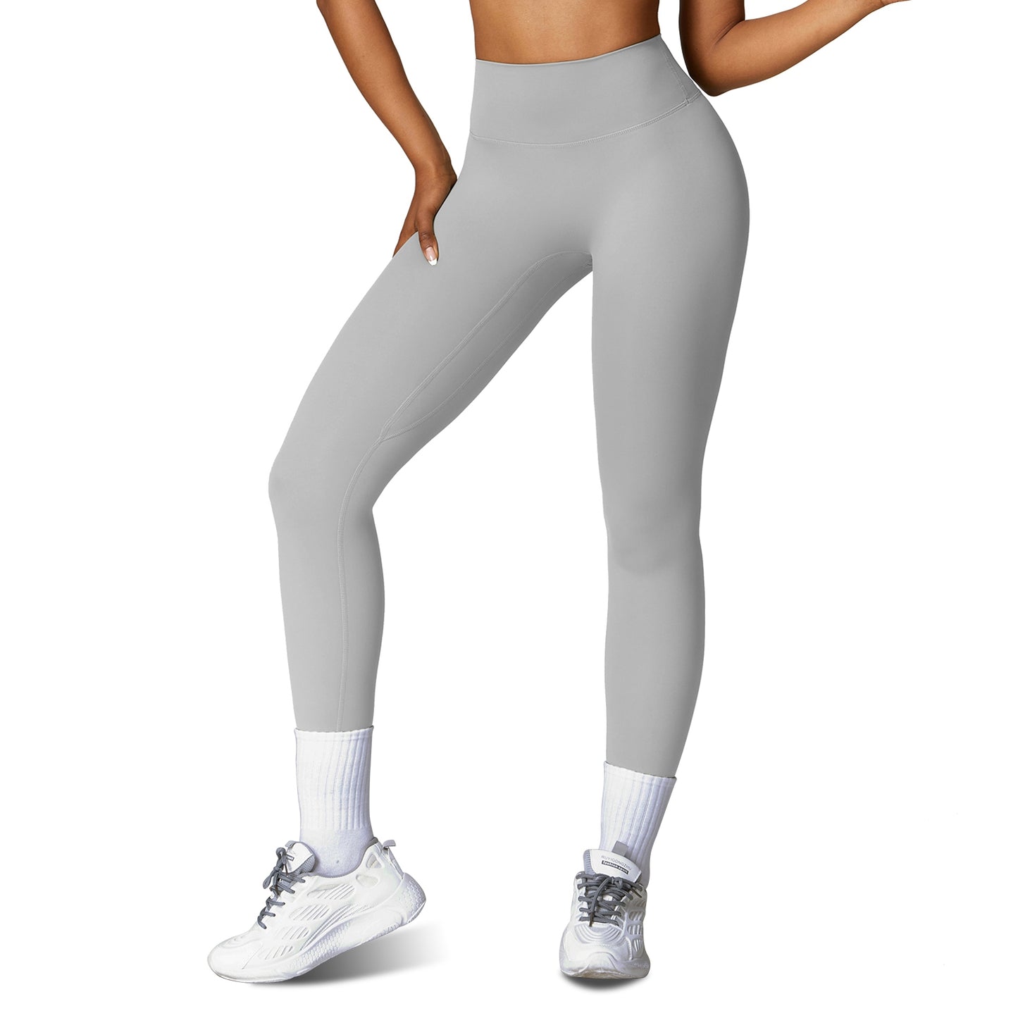 Women wearing high-waisted training leggings designed for workouts and active movement