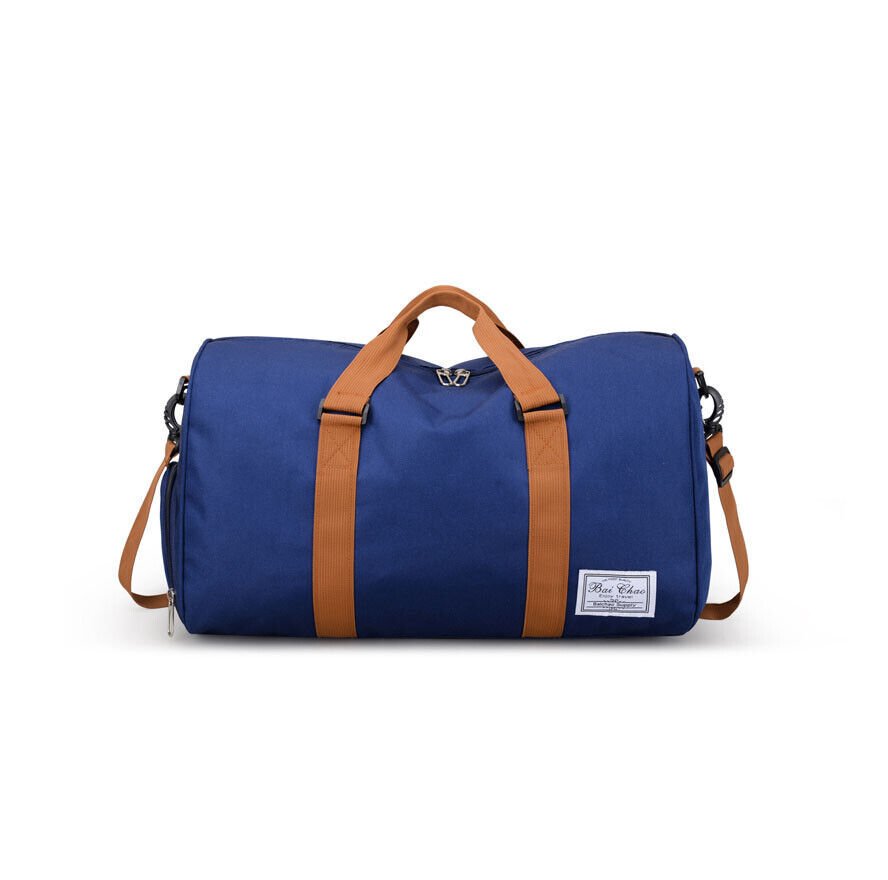 A durable and stylish large canvas training and travel bag with spacious compartments, breathable shoe pocket, and adjustable cushioned shoulder strap for convenience and versatility  - TNT Fitness Gear
