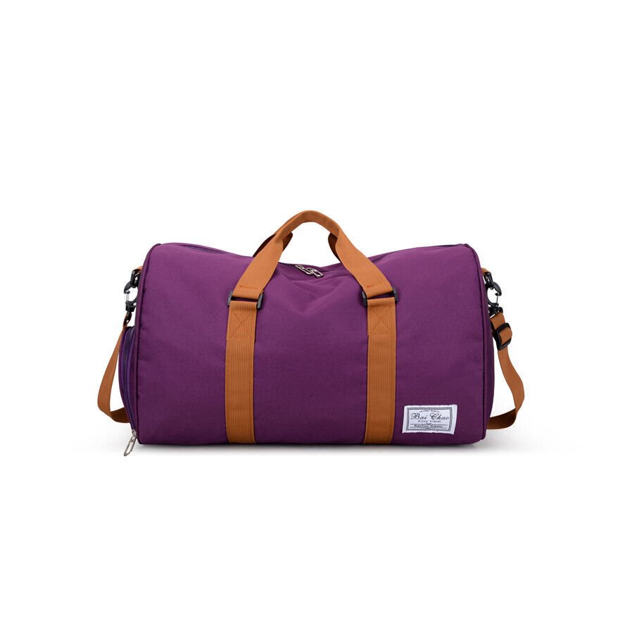 A durable and stylish large canvas training and travel bag with spacious compartments, breathable shoe pocket, and adjustable cushioned shoulder strap for convenience and versatility  - TNT Fitness Gear