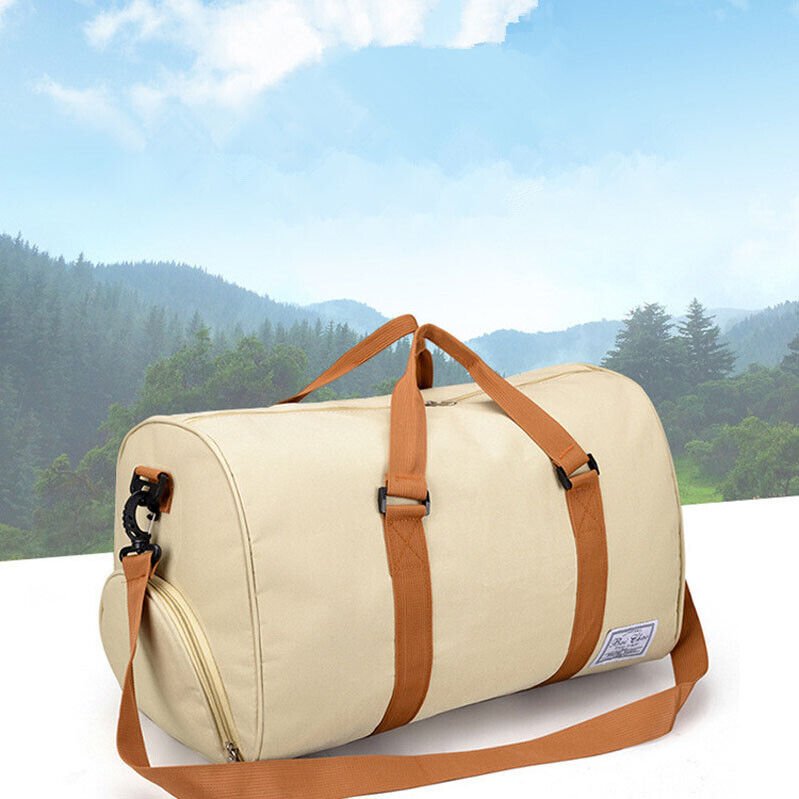 A durable and stylish large canvas training and travel bag with spacious compartments, breathable shoe pocket, and adjustable cushioned shoulder strap for convenience and versatility  - TNT Fitness Gear