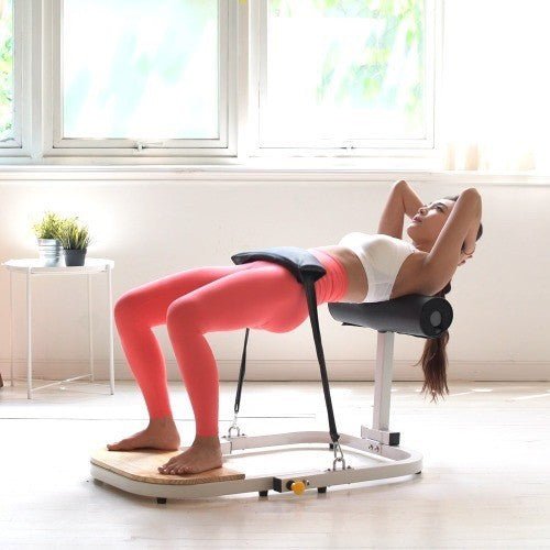 athlete performing hip thrust exercise at home