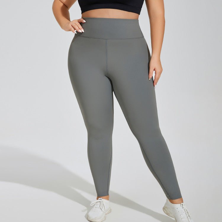 Plus-size seamless high-waist yoga pants in Waxon Green, Monet Purple, and Quiet Black, featuring quick-drying fabric and a hip-lifting design for comfort and style. - TNT Fitness Gear