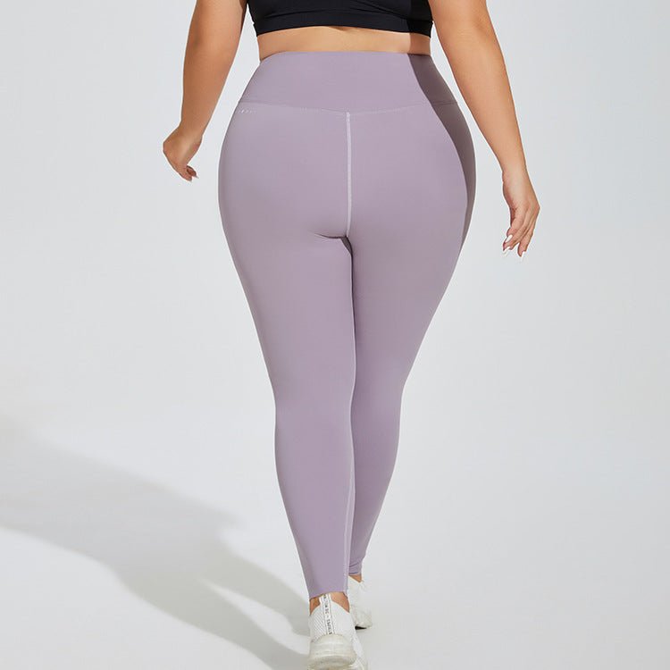 Plus-size seamless high-waist yoga pants in Waxon Green, Monet Purple, and Quiet Black, featuring quick-drying fabric and a hip-lifting design for comfort and style. - TNT Fitness Gear