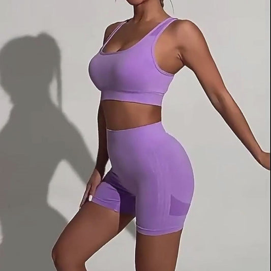 Video for 2-Piece Sports Fitness Yoga Set featuring premium nylon-spandex fabric, hip-lifting shorts, and a hollow-back bra for breathable comfort and stylish performance. - TNT Fitness Gear