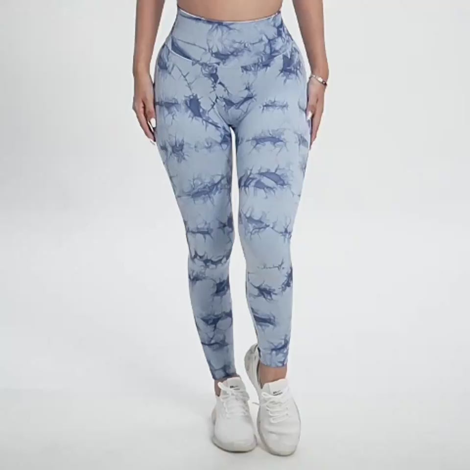Video demonstration of the Women's Seamless Push-Up Tie-Dye Yoga Leggings, showcasing their snug, flexible fit and how they contour to your curves. See the vibrant tie-dye design and seamless construction in action, delivering comfort and style for yoga, workouts, or casual wear  TNT Fitness Gear