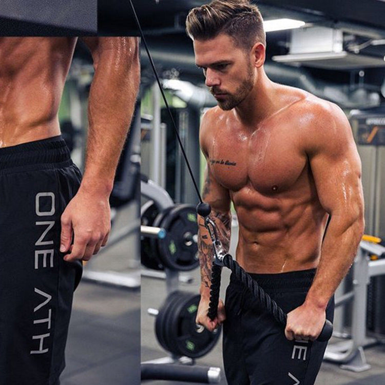 Men's gym shorts with an elastic waistband, perfect for running and workouts. Comfortable and versatile by TNT Fitness Gear
