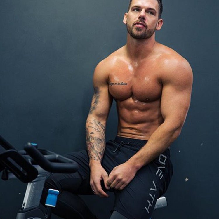 Men's gym shorts with an elastic waistband, perfect for running and workouts. Comfortable and versatile by TNT Fitness Gear