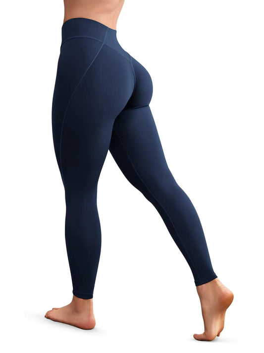 Women’s navy V-shaped workout leggings with no front seam, butt lifting design, high-waisted tummy control, and sculpting side contours.
