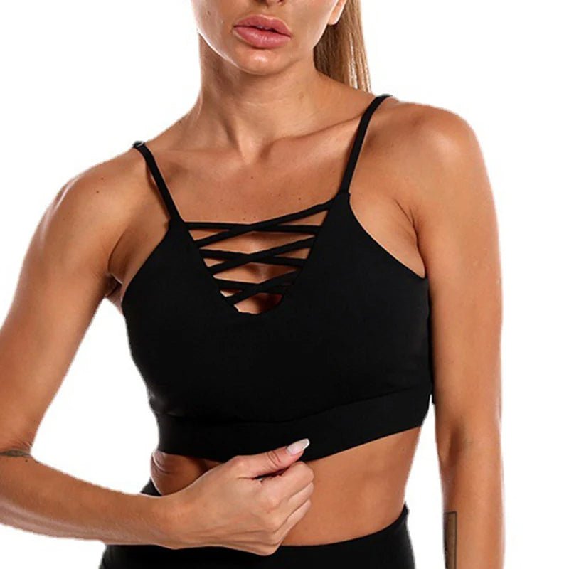 Woman wearing seamless training set with leggings and crop top during workout
