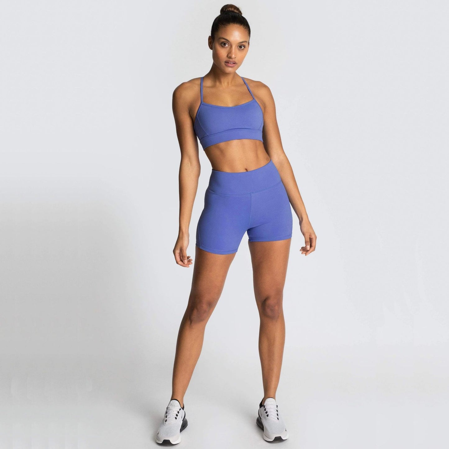 Women wearing a lightweight training shorts set designed for gym workouts and active movement
