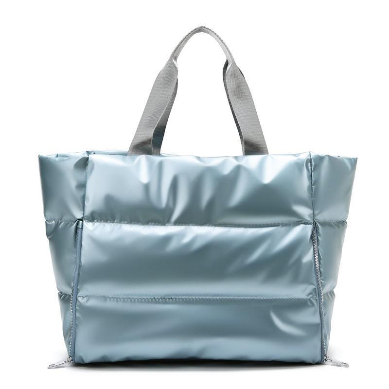 Chic and durable women's training bag made of waterproof nylon, featuring multiple compartments and versatile carrying options for the modern woman on the go – TNT Fitness Gear