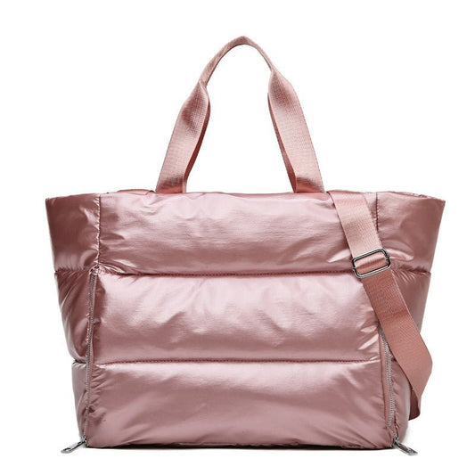 Chic and durable women's training bag made of waterproof nylon, featuring multiple compartments and versatile carrying options for the modern woman on the go – TNT Fitness Gear