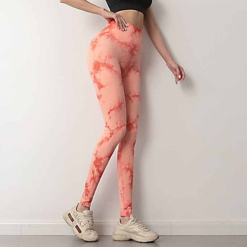 Women's Seamless Push-Up Tie-Dye Yoga Leggings designed for style and comfort, featuring a stretchy, seamless fit that enhances curves and flexibility. Perfect for yoga, workouts, or casual wear, with an eye-catching tie-dye design - TNT Fitness Gear